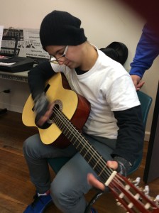 Ibi playing Guitar